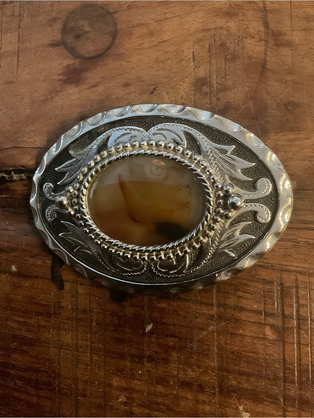 Ornate Silver-Tone Decorative Belt Buckle with Brown Agate Accent